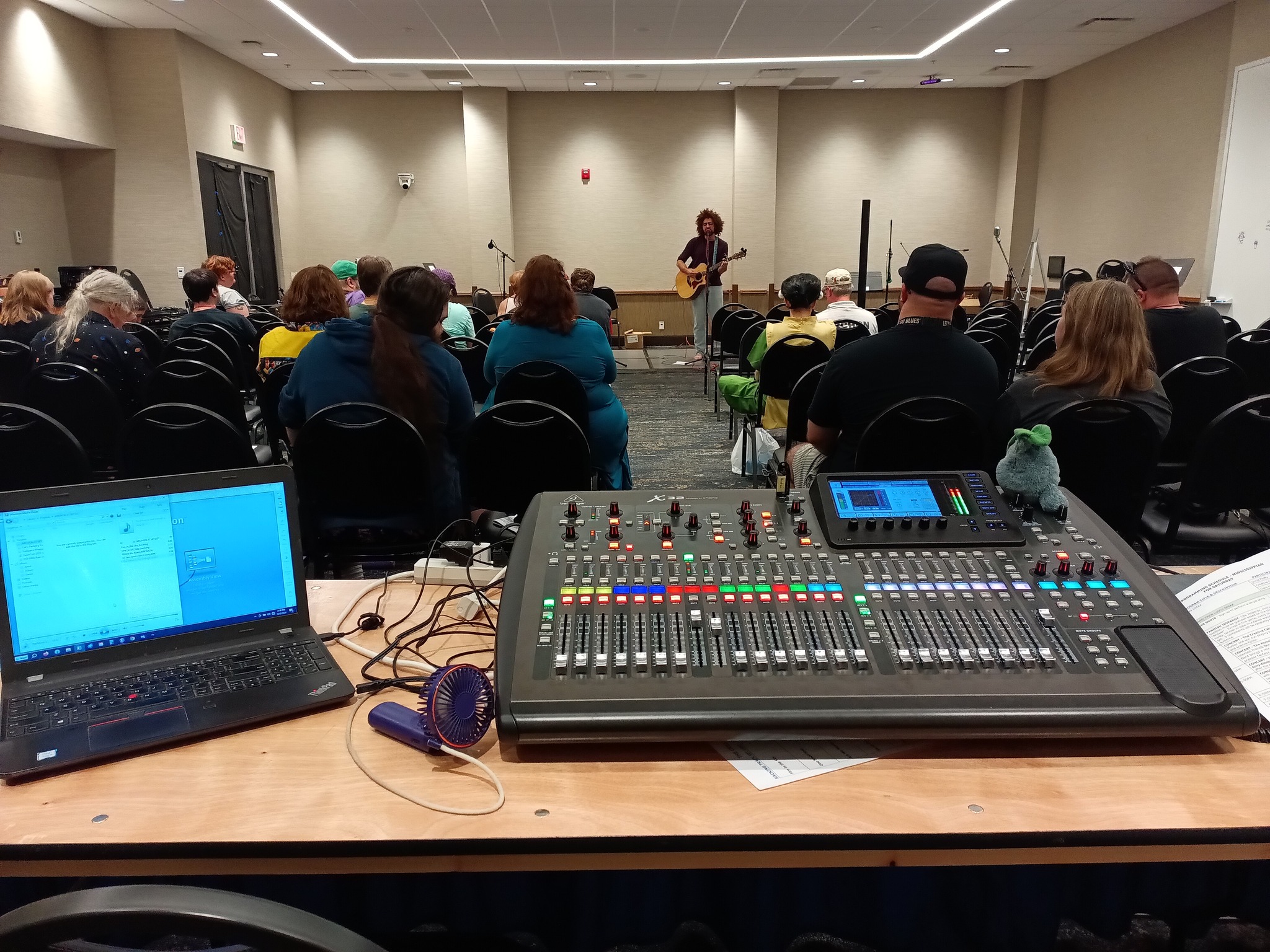 Musicians performing at a filk circle.